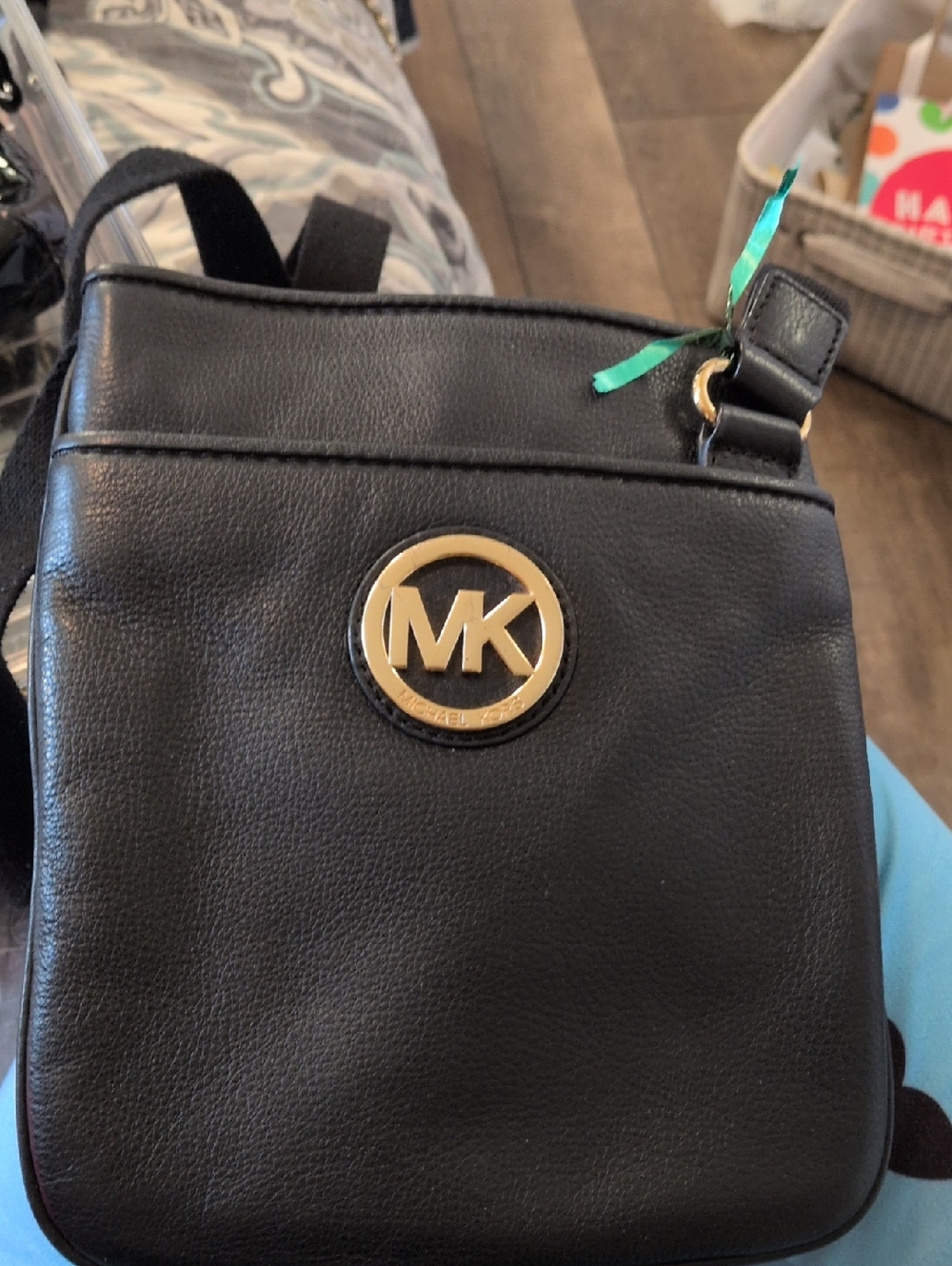 Michael Kors Black Leather Messenger Bag with Gold MK Emblem